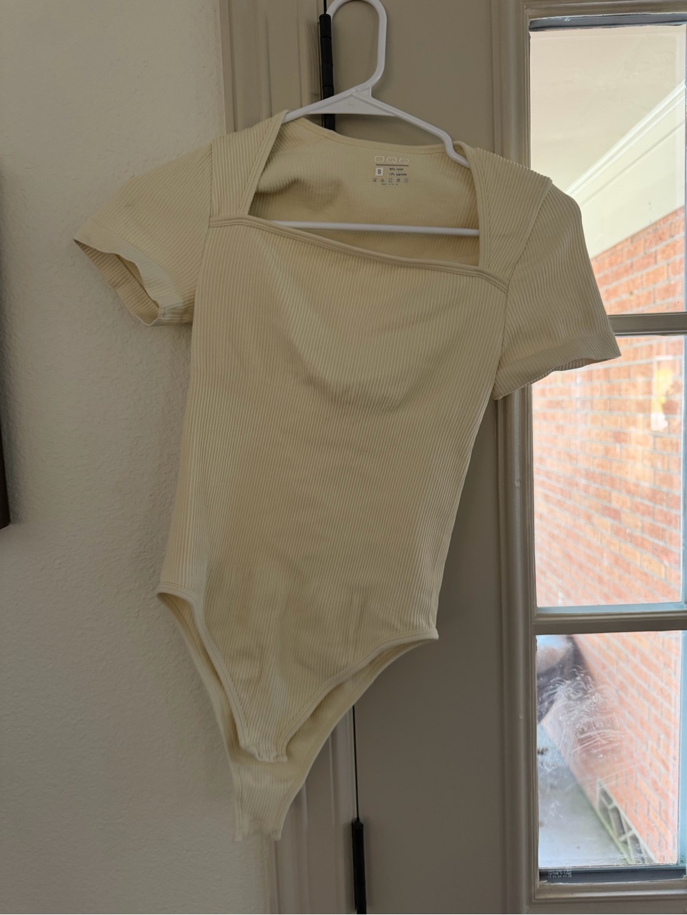 Ribbed Short-Sleeve Bodysuit in Cream